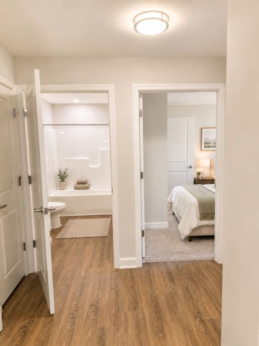 A small room with a bed and a toilet.