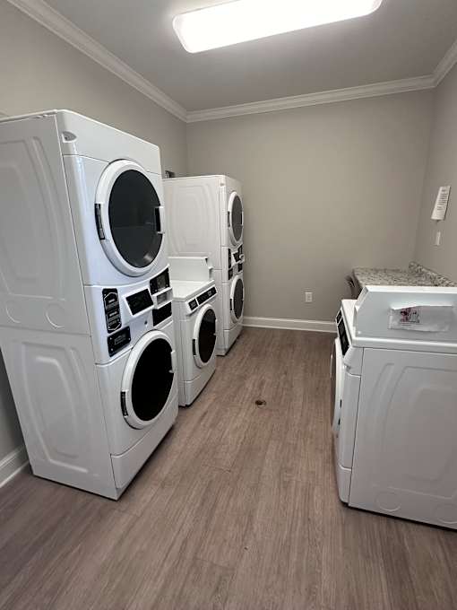 a kitchen with a stove and a oven and a microwave