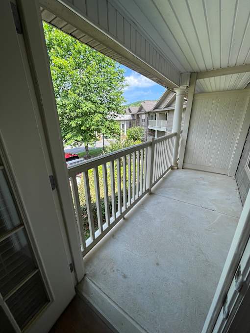 A view from the top of a staircase looking down.