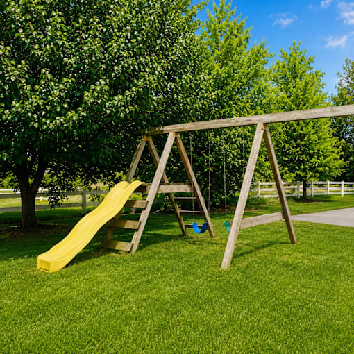 A wooden swing set with a yellow slide in a grassy area.