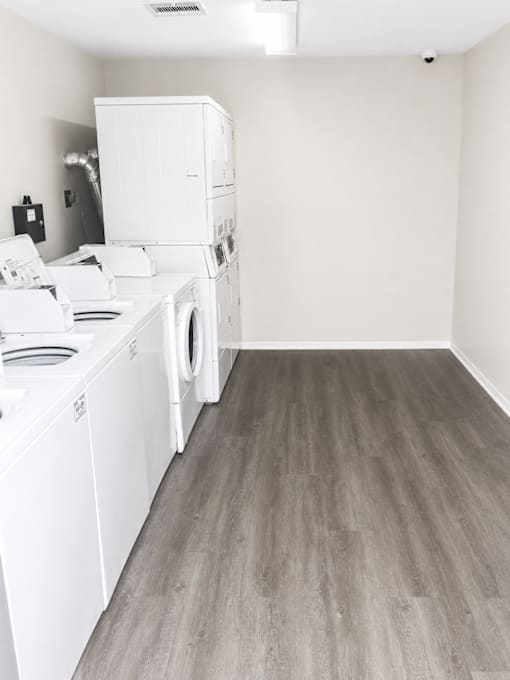 A laundry room with a washer and dryer.