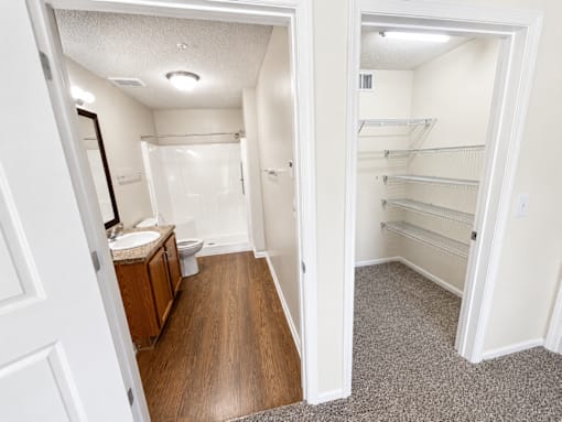 A small white bathroom with a toilet and sink.