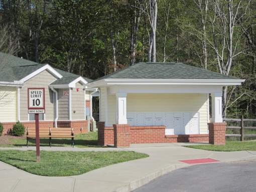 a house with a speed limit sign in front of it