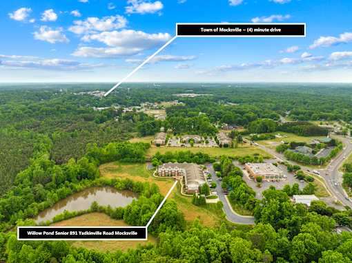 A bird's eye view of a town with Willow Pond Seniors 813 Yadkinville Road Mocksville highlighted.
