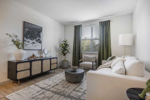 a living room with a couch and a chair