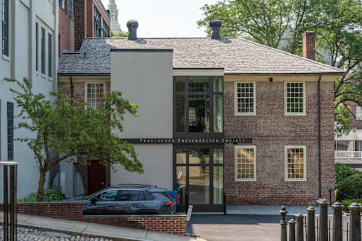 A building with a sign that says providence preservation society
