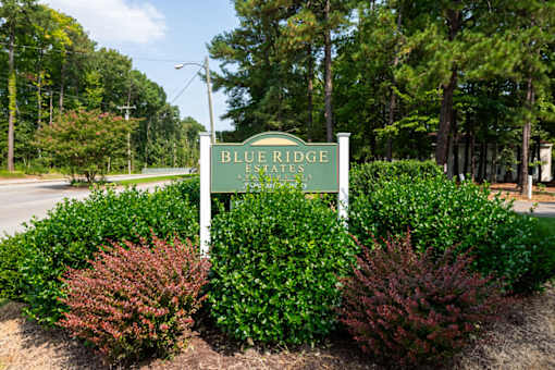 Property entrance sign with landscaping at Blue Ridge Estates Apartments, Richmond