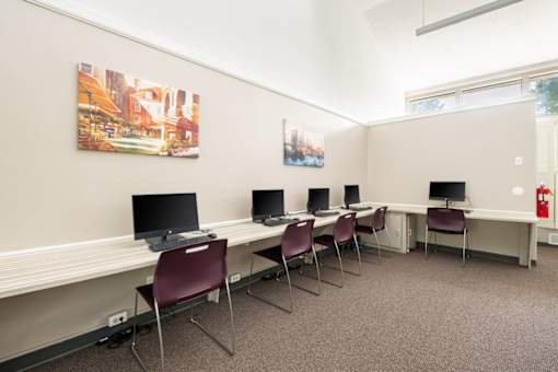 Computer lab with workstations and seating at Blue Ridge Estates Apartments, Richmond, VA 23225