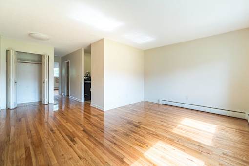 wooden floors and white walls at Coppermine Village Apartment , Bristol, Connecticut