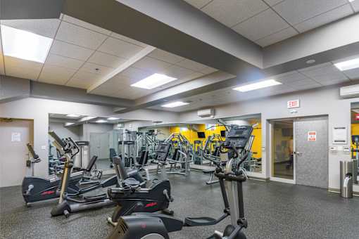 A gym with treadmills and exercise equipment at Edmands House, Framingham, 01701