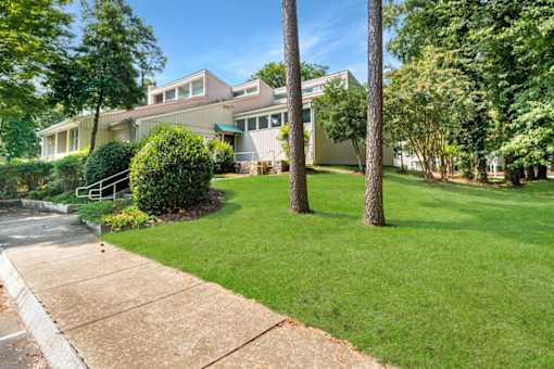 Modern apartment building with lush lawn at Blue Ridge Estates, Virginia, 23225
