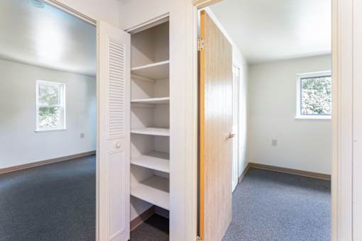 Bedroom closet with built in shelving at Blue Ridge Estates Apartments, Virginia, 23225