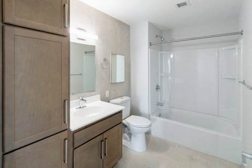 Designer Bathroom With Extra Storage at Pok Oi Residences, Boston, MA, 02111