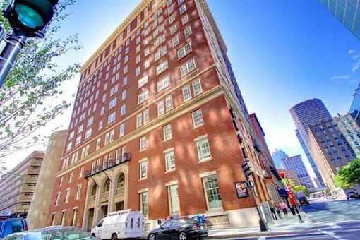 a tall brick building on the corner of a city street  at 140 Clarendon, Boston, MA, 02116