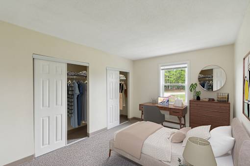a bedroom with a bed and a closet with a dresser and a mirror at Blue Hills Village, Canton, Massachusetts