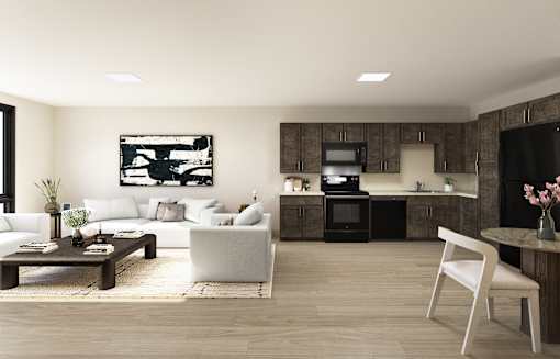 A modern living room with a white sofa, a wooden coffee table, and a white chair.