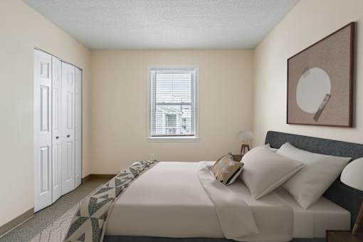 A bedroom with a bed at Blue Hills Village, Canton, MA.