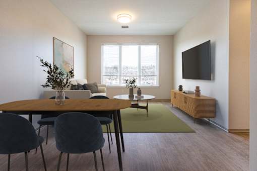 A modern dining room with a wooden table and chairs  at 35 Broadway Apartments, Menands, New York