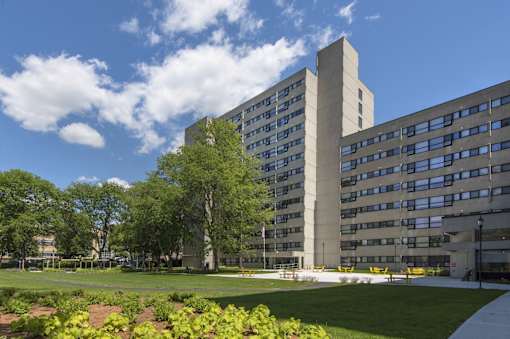 Modern apartment building with landscaped courtyard at Baystate Place Apartments, Massachusetts, 1104
