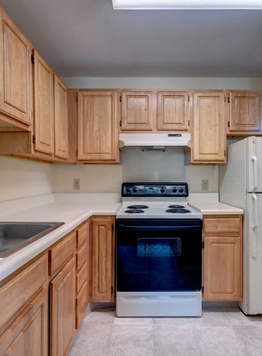 Kitchen  With Tile Flooring at Robinson Cuticura Mill Apartments in Malden , MA.