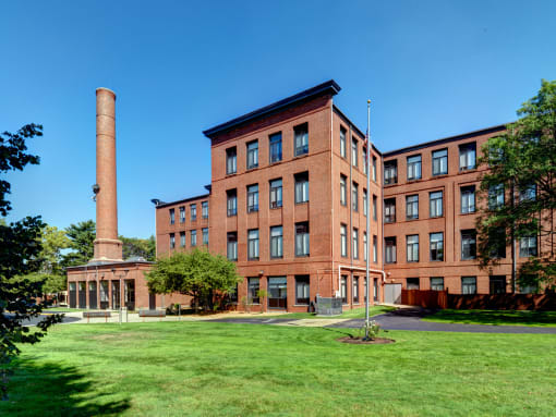 Exterior View of  Converted Mill and Now Senior Housing at Robinson Cuticura Mill Apartments in Malden , MA.