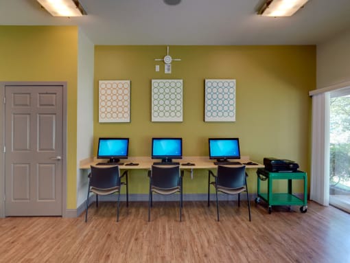 Community Room with Computers at Wilkins Glen Apartments in Medfield, MA