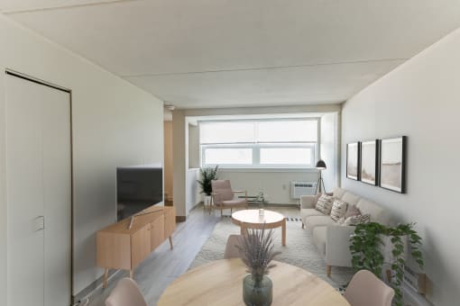 a living room with a couch and a table
