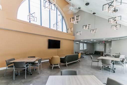 a large open space with tables and chairs