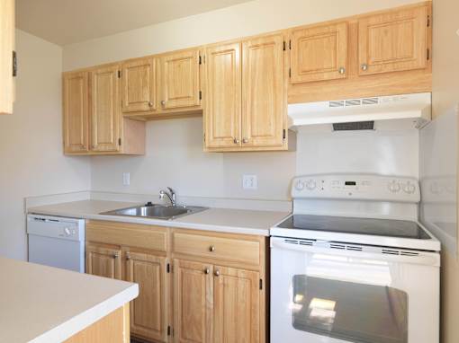 Kitchen with appliances at Chatham West Apartments, Brockton, MA