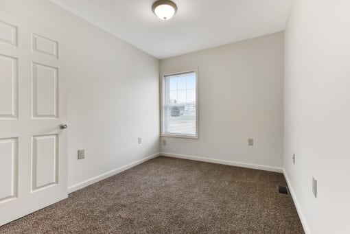Bedroom Layout With Carpeted Flooring  at Summit Wood Apartments, New York, 13601