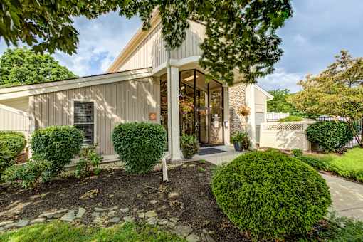 A house with a front yard and a tree in the front at Williamsburg Estates, Harrisburg, PA, 17112