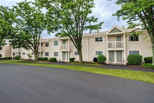 A residential building with a tree in front at Williamsburg Estates, Harrisburg, PA, 17112