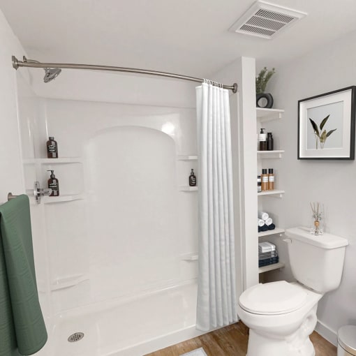 Bathroom with a shower and a toilet