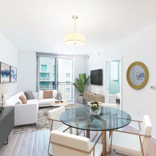 Living room with white furniture  at Douglas Enclave located in Miami, Florida