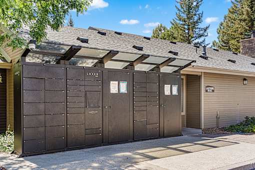 A row of dark brown garage doors with the word "LUXE" on the top.