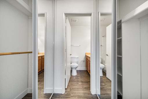 A bathroom with a toilet and sink.