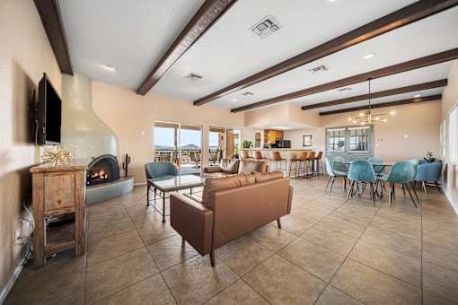 A living room with a fireplace and a couch.