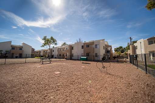 Dog park with play structures.