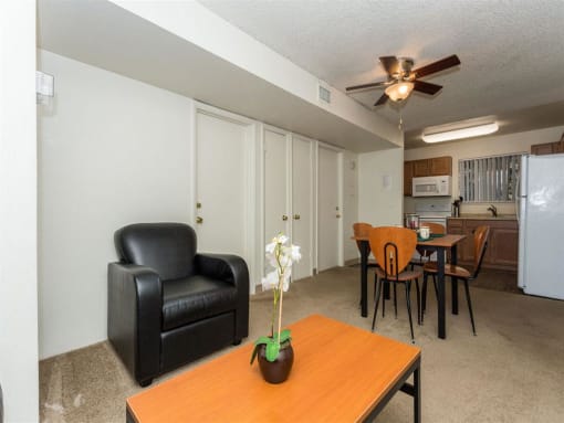 Living Room With Dining Area at Pine View Village Apartments, Arizona