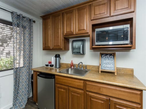 Efficient Appliances In Kitchen at Pine View Village Apartments, Arizona, 86001