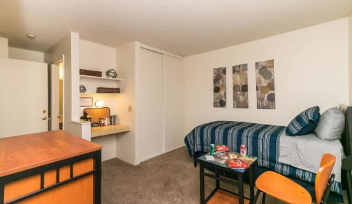 Living Room With Kitchen View at Pine View Village Apartments, Flagstaff