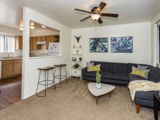 Living Room With Kitchen View at University Square Apartments, Flagstaff, Arizona