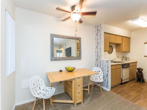 Dining Area With Kitchen View at Woodlands Village Apartments, Flagstaff, 86001