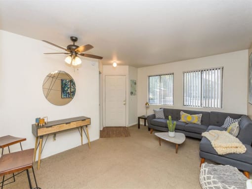 Ceiling Fan In Living Room at Woodlands Village Apartments, Arizona, 86001