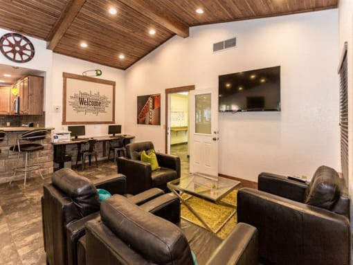 Clubroom With TV at Woodlands Village Apartments, Arizona
