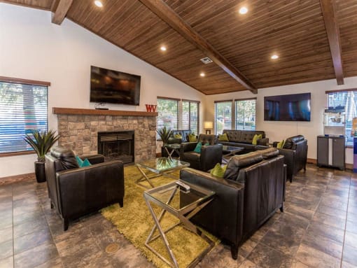 Lounge Area With Fireplace at Woodlands Village Apartments, Flagstaff, AZ, 86001