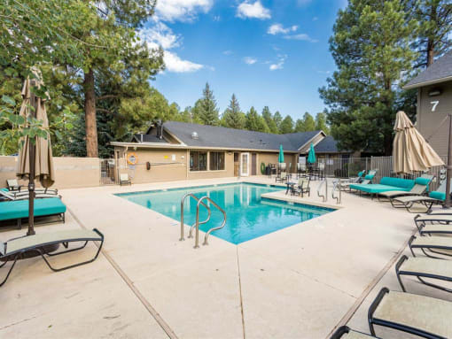 Swimming Pool And Sundeck at Woodlands Village Apartments, Arizona