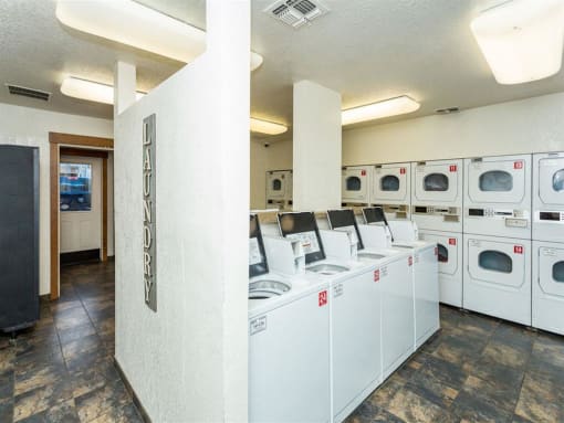 Laundry Room at Woodlands Village Apartments, Flagstaff