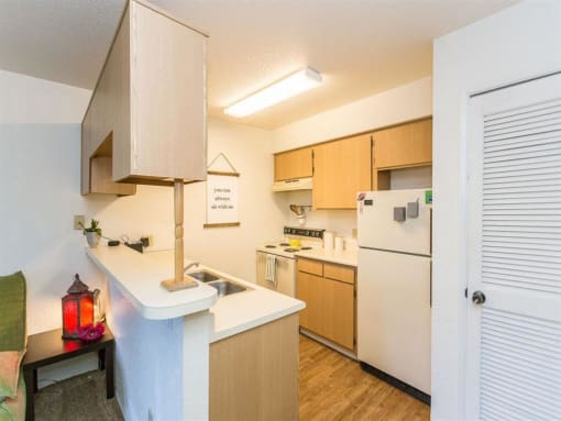 Fully Equipped Kitchen at Woodlands Village Apartments, Arizona