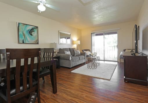 a living room with seating in an apartment for rent